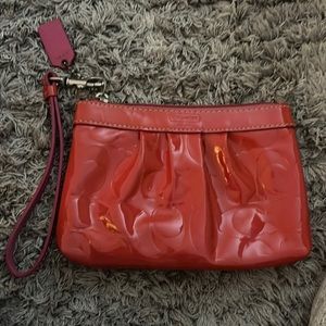 Coach pink little clutch wristlet